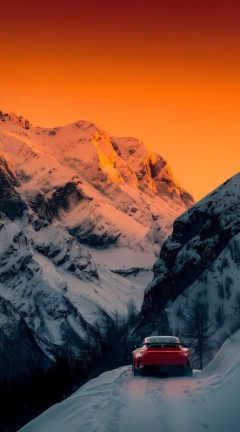 Red porsche snowy sunset 240x432